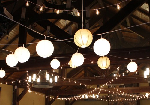 With over 400 bulbs strung overhead, our lights can be dimmed to balance with the ambient lighting.